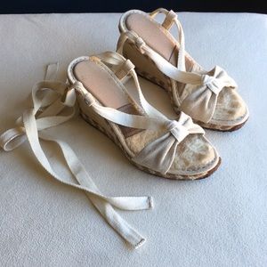 UGG wedge heel sandals with. Sherpa footbed size 7, tie around ankle.